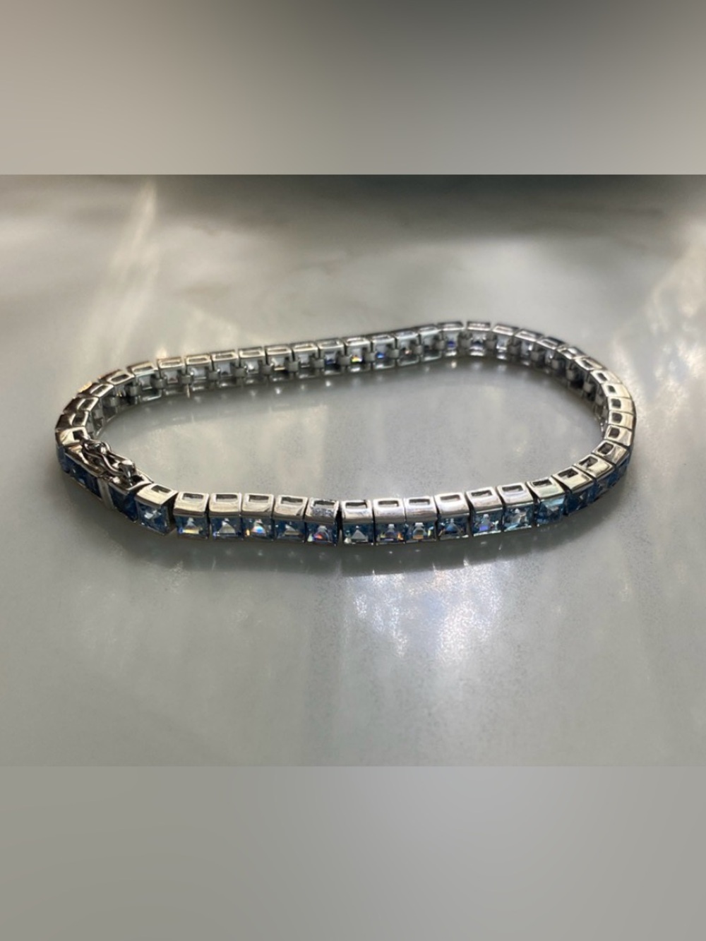 Sterling Silver Princess Cut Blue Gemstone (Aquamarine? Topaz?) Tennis Bracelet